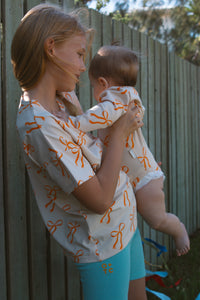 Olive & the Captain - Cream Bows Relaxed Fit Tee